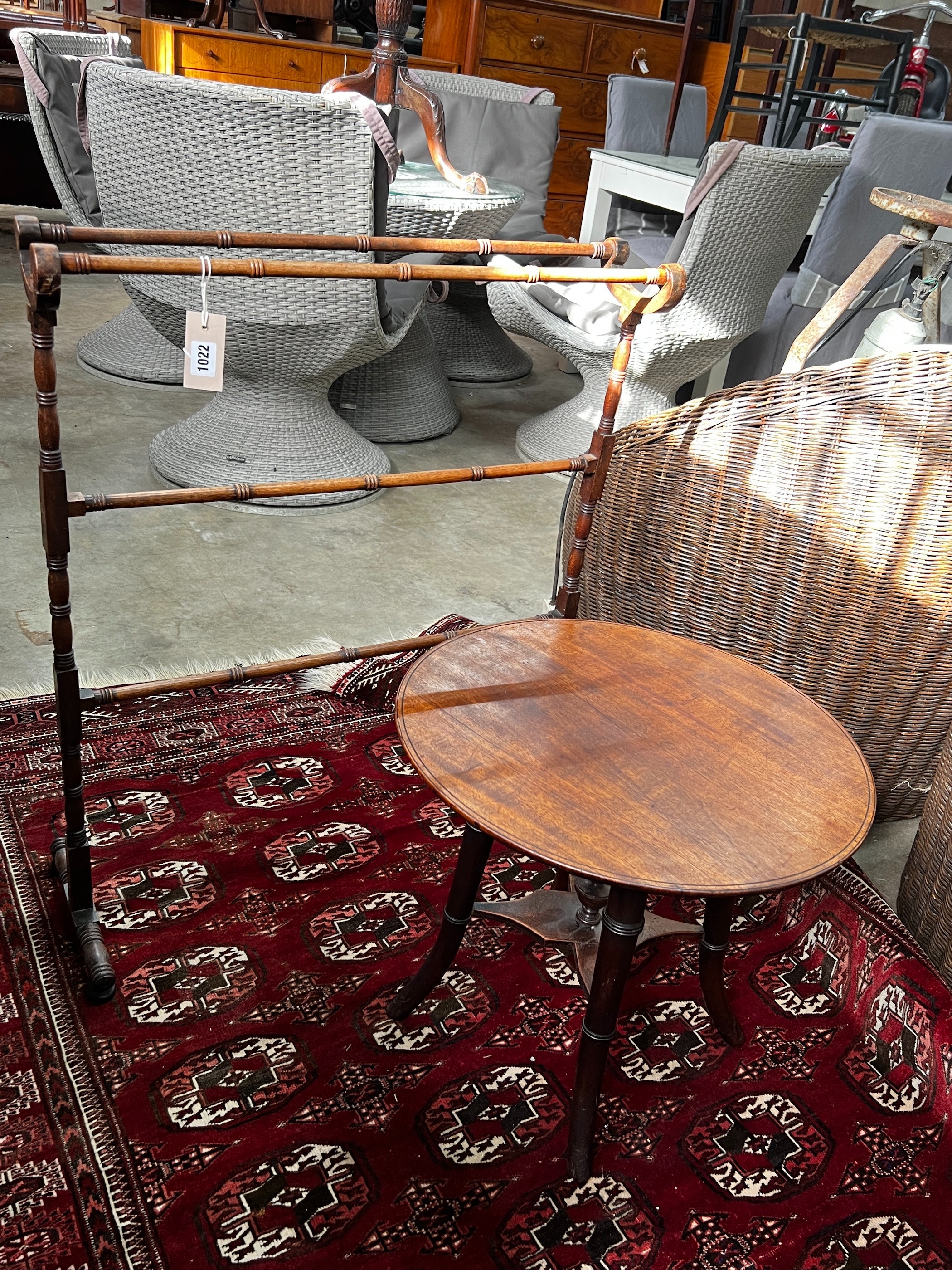 A Victorian mahogany towel rail, height 82cm and a Victorian and later circular occasional table